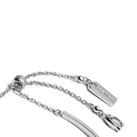 COACH Signature Silver Tone Slider Bangle