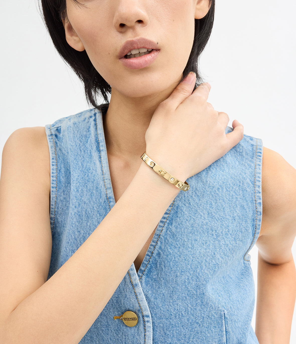 COACH Gold Hinged Bangle