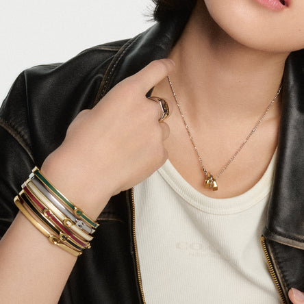 COACH Gold Plated Cream Enamel Hinged Bangle