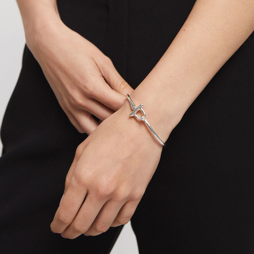 Uno De 50 Silver Plated Bangle bracelet with white topaz