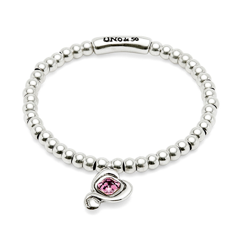 Uno De 50 Beaded stretch bracelet with heart and pink crystal